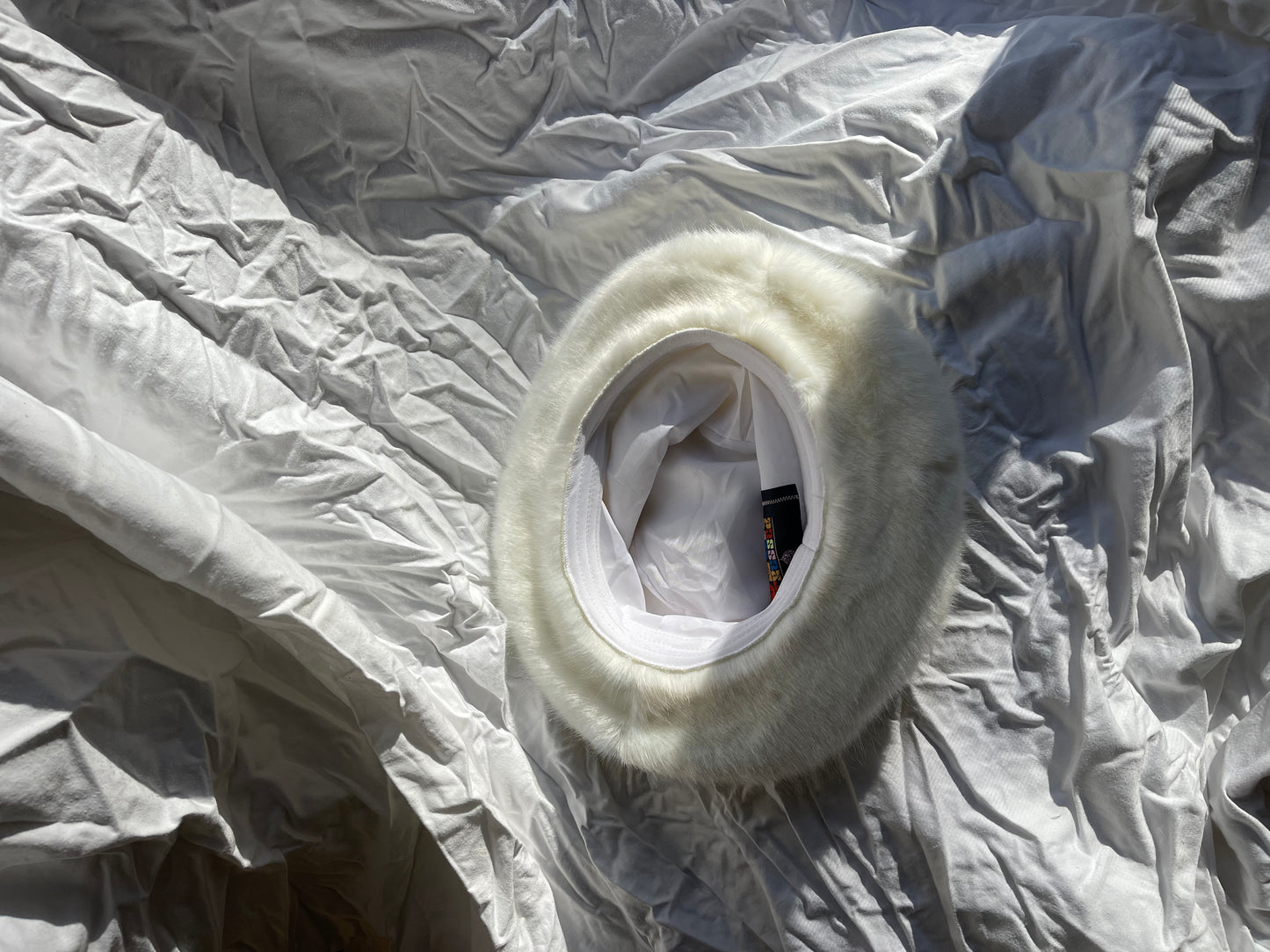 Monica White faux fur bucket hat